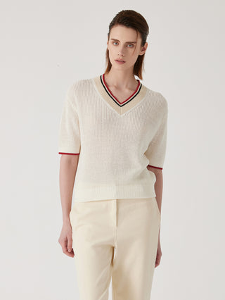 Cream ribbed knit V-neck top with striped neckline trim and short sleeves