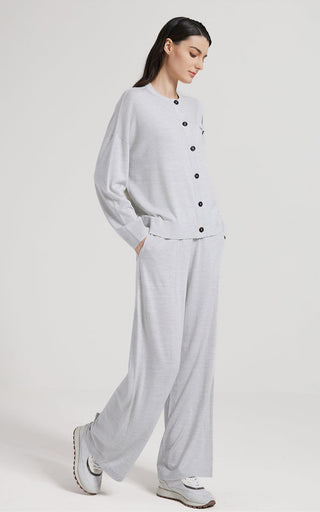 Light gray wool silk knit cardigan with button closure and ribbed hem, full outfit view