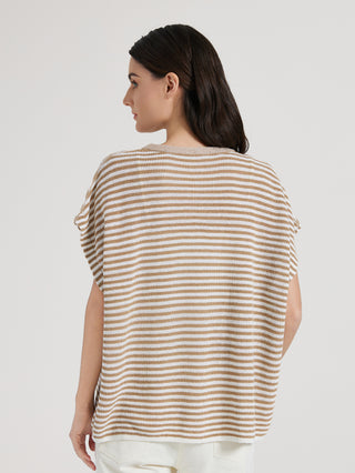 Back view of camel and cream striped batwing knit top with loose drape