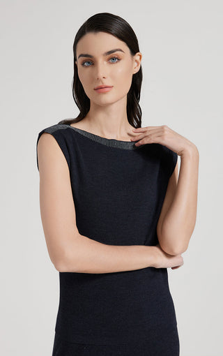 Sleeveless dark knit tank top with crew neck ribbing and fitted straight silhouette
