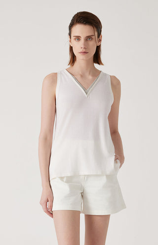 White V-neck tank top with sleeveless silhouette and contrasting neckline trim