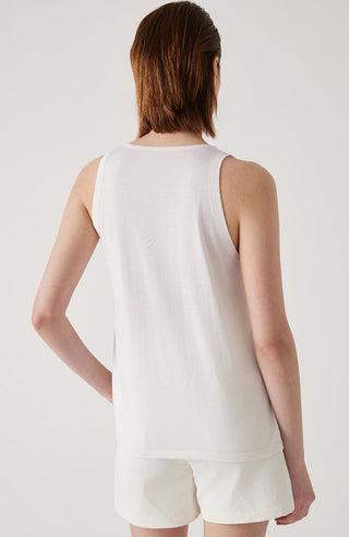 White sleeveless tank top shown from back with V-neck style and contrasting trim