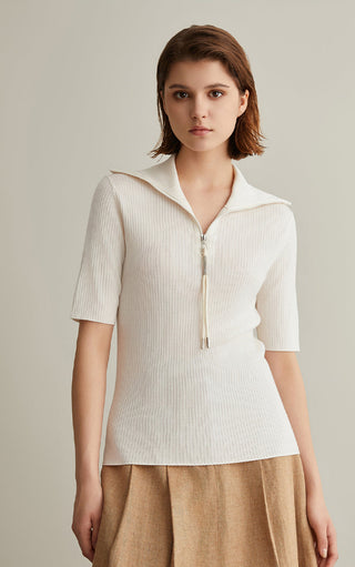 Ivory white wool-silk knit top with half-zip mock neck and short sleeves, ribbed finish