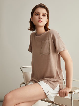Khaki short-sleeve T-shirt with front patch pocket; relaxed straight silhouette