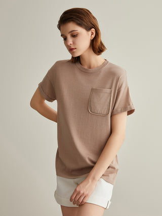 Khaki crew-neck T-shirt with front pocket and subtle seam lines; straight hem