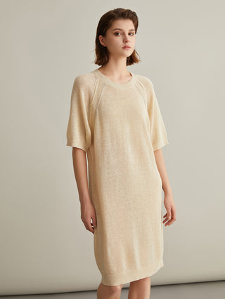 Beige knit dress with beaded yoke panels and short sleeves, straight hem