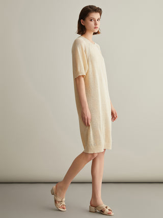 Beige knit midi dress side view with short sleeves and crew neckline