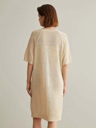 Beige knit midi dress back view with short sleeves and ribbed hem