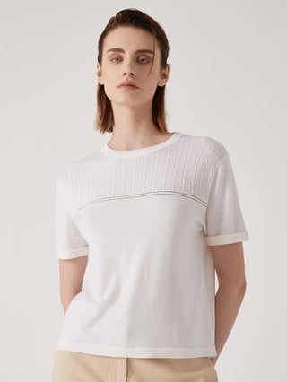 White wool-silk textured knit top with crew neck and beaded chain trim across chest