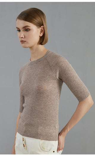 Wool blend ribbed fitted pullover, purplish brown, close side view of raglan seams