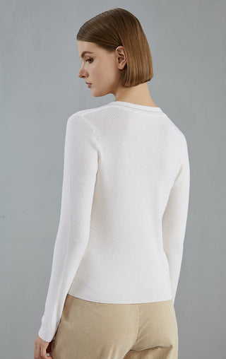 White fine wool V-neck pullover, back view with long sleeves and smooth knit