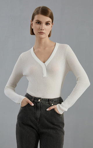 White wool-blend fine knit V-neck sweater with long sleeves and half-zip placket