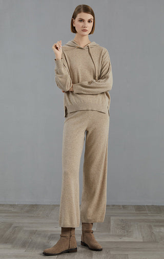 Camel wide-leg knit pants with relaxed waist and long straight-leg silhouette
