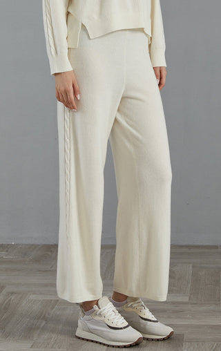 White wide-leg knit pants with cable-trim side panel detail and wide leg opening