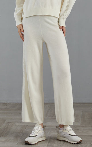 White wide-leg cashmere knit pants with cable trim along side seam