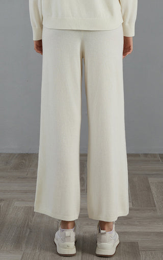 White cashmere knit wide-leg pants with straight fall and simple hem