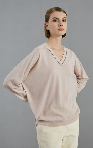 Pale taupe wool V-neck knit pullover with beaded collar trim, long sleeves
