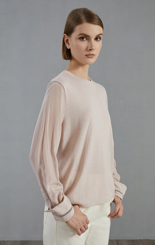 Pale taupe wool-blend pullover with crew neck; beaded cuff trim at wrists.