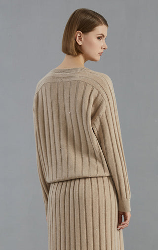 Camel cashmere V-neck ribbed sweater from back/side view, vertical stripe knit texture