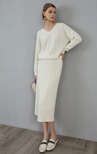White cashmere V-neck ribbed sweater with matching knit skirt, long sleeves and ribbed cuffs