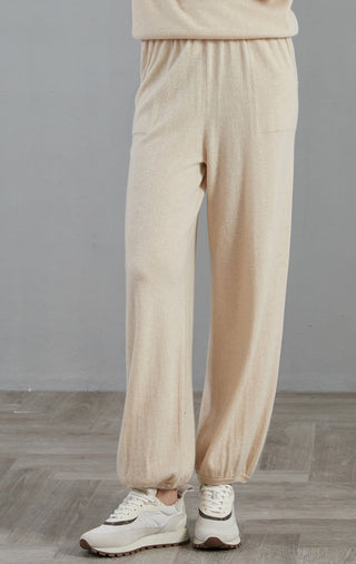 Apricot cashmere wide-leg lounge pants with roomy legs and gathered ankle cuffs