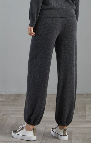 Dark gray cashmere wide-leg lounge pants, side view with gathered ankle cuffs
