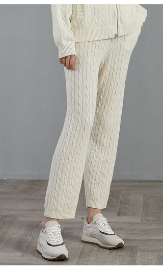 White cable-knit wide-leg pants with center-front seam and ribbed hem cuffs