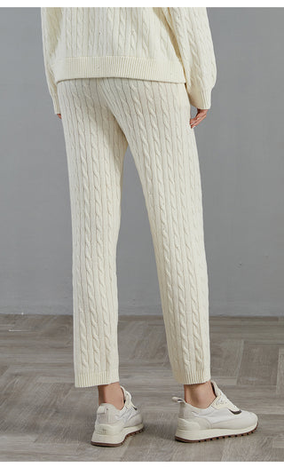 White cable-knit wide-leg pants, vertical cable texture, ribbed waistband