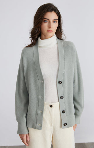 Light green wool ribbed cardigan front view, V-neck button placket with dark buttons