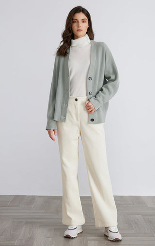 Light green wool ribbed button cardigan with dark buttons, V-neck, long sleeves