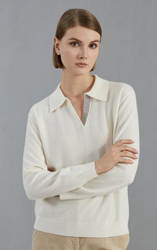 White cashmere sweater with collared V-neck and subtle beaded neckline detail