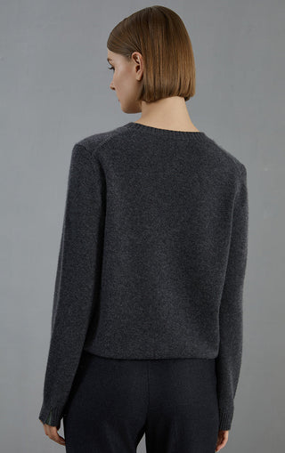 Dark gray cashmere crew-neck pullover sweater, back view with ribbed hem