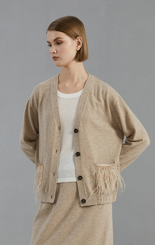 Camel cardigan with front button placket and feather-trimmed pockets/ cuffs