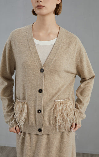 Camel cashmere cardigan, centered buttons and feather fringe details at cuffs
