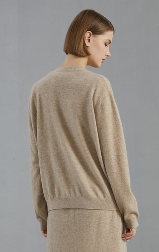Camel cardigan back view with clean hem and long sleeves, cashmere knit texture
