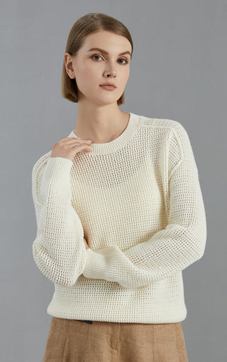 Camel open-mesh wool knit pullover, crew neckline and ribbed cuffs; relaxed fit