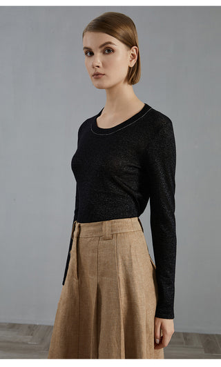 Black wool-blend knit pullover with long sleeves and beaded crew neckline, side view