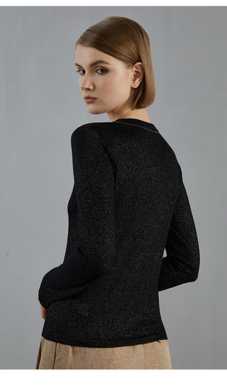 Black wool-blend knit pullover with long sleeves and beaded crew neckline, back view