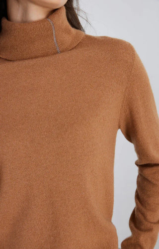 Brown turtleneck sweater close-up of knit texture and ribbed collar