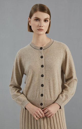 Camel cashmere cardigan with center button placket and ribbed cuffs at wrist