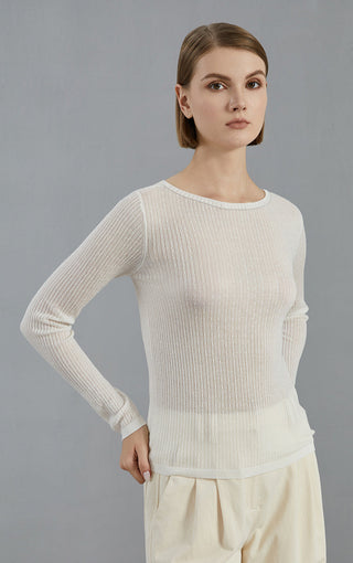 White crewneck ribbed knit sweater, fitted long sleeves with textured rib detailing.