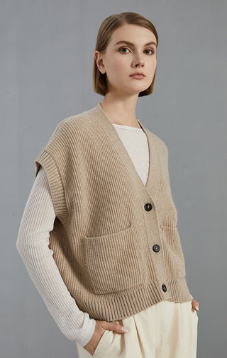 Camel ribbed knit cardigan with V-neck, dark buttons, and two front patch pockets