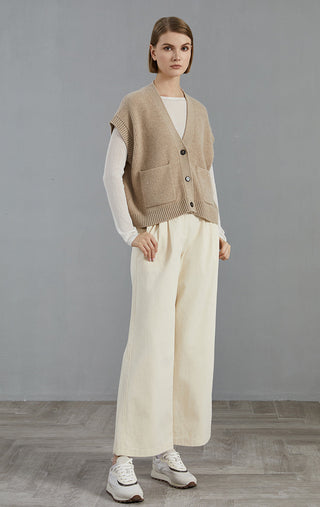 Camel V-neck ribbed knit cardigan with button closure and patch pockets, relaxed fit