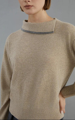 Camel cashmere fine-knit pullover close-up of beaded collar trim and neckline