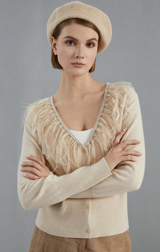 Apricot cashmere cardigan with feather trim, V-neck button front, long sleeves
