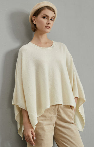 Cashmere oversized poncho sweater, asymmetrical hem and relaxed fit over shoulders
