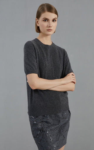 Dark gray cashmere short-sleeve sweater, arms crossed, crew neck rib-knit texture