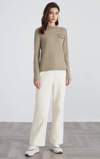 Olive cashmere knit top, crew neck, long sleeves; silver chain pocket detail