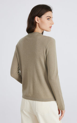 Olive cashmere knit top, back view, crew neck and embroidered pocket trim detail