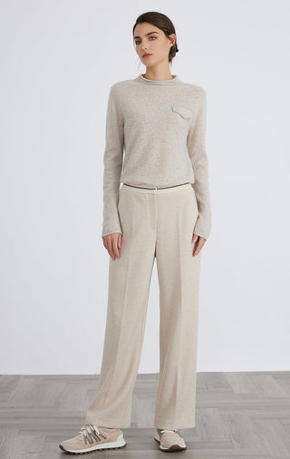 Light gray cashmere knit top with crew neck, long sleeves, silver chain pocket detail